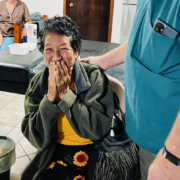 Woman cries tears of joy after her sight is restored.